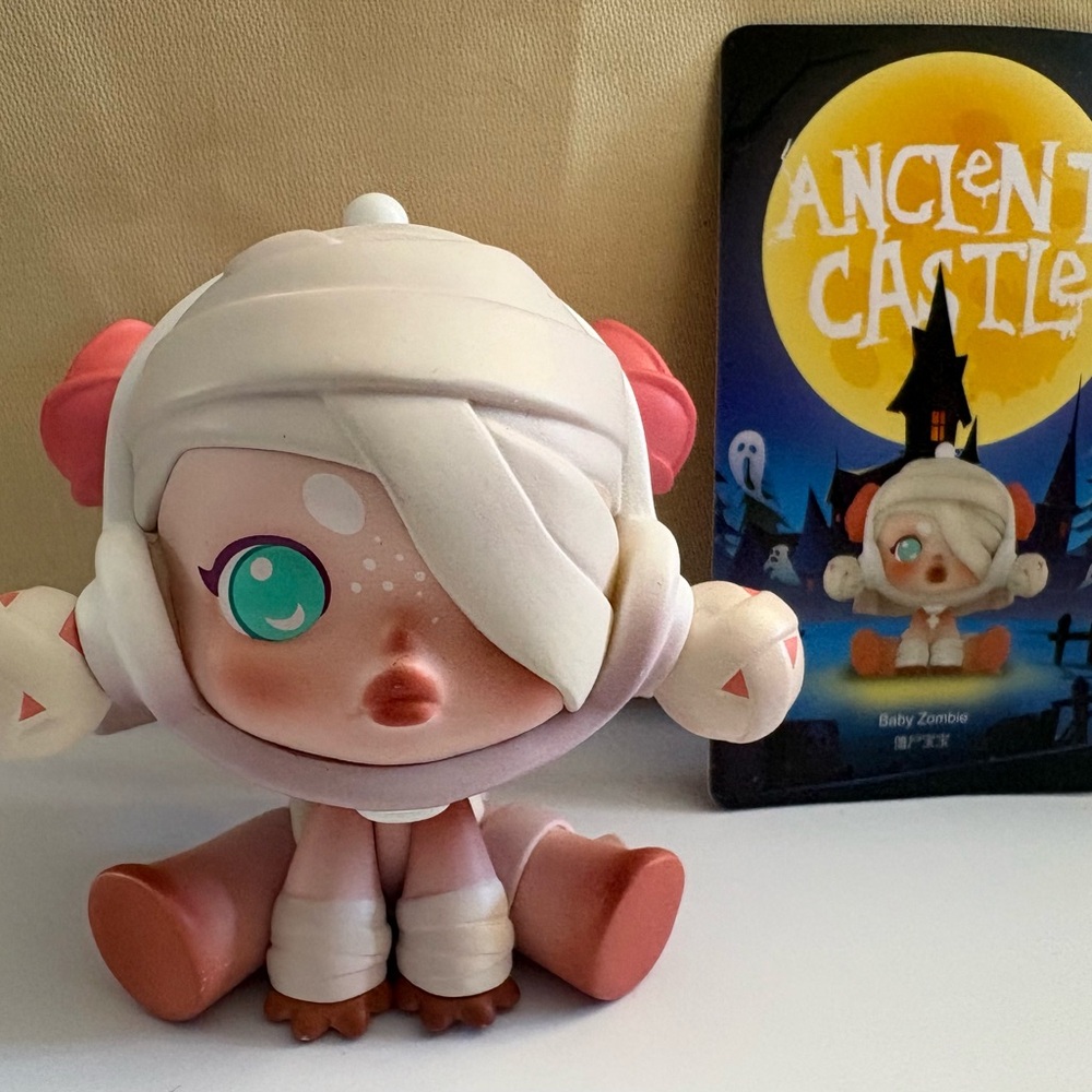 Discontinued Baby Zombie from Pop Maryโs Ancient Castles Skull Panda series.